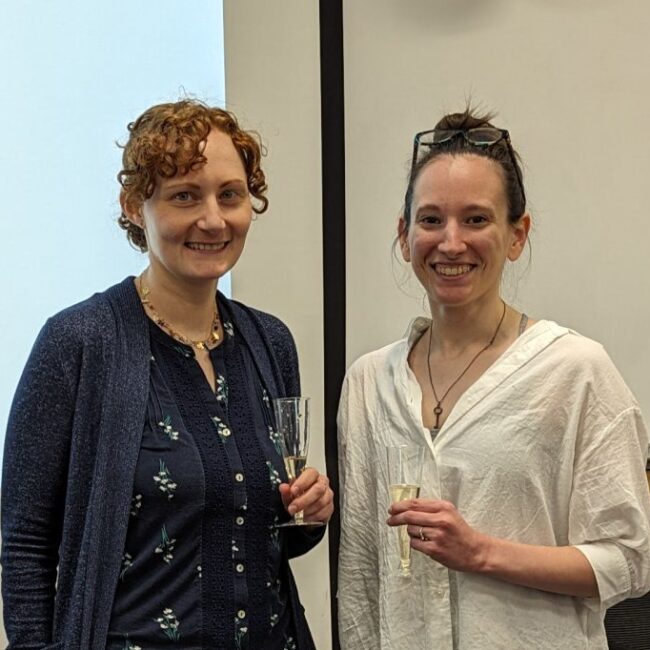 Talia Lerner and Ashley Holloway with champagne